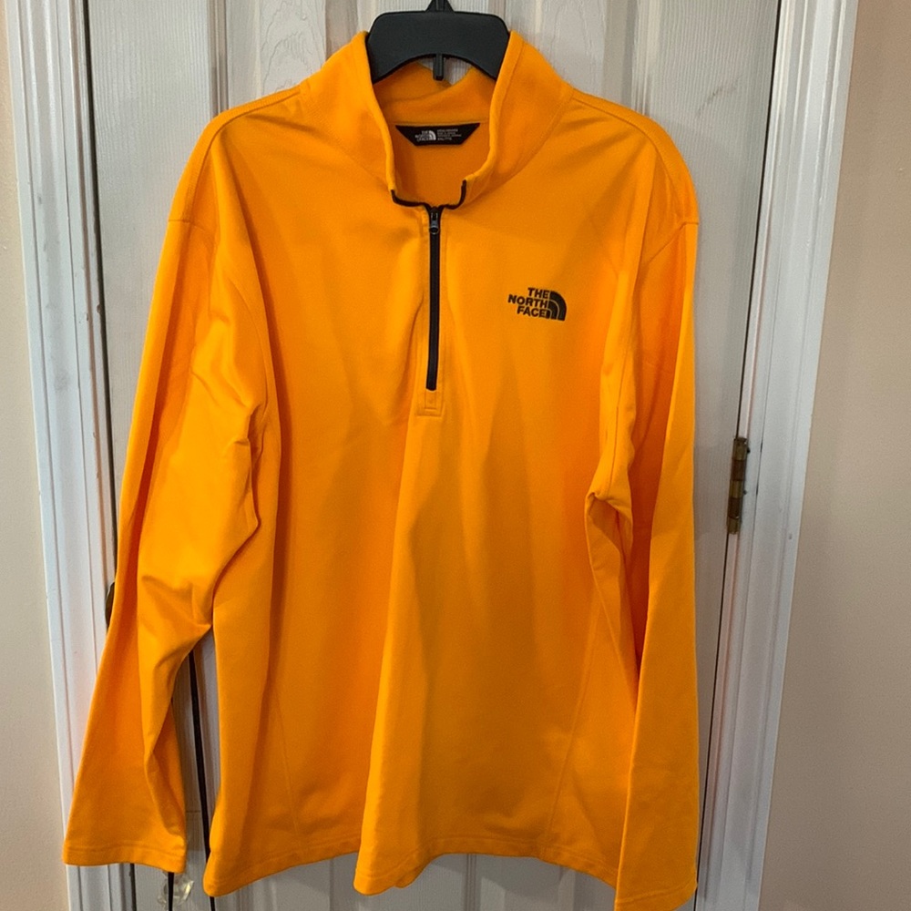 Yellow The North Face 1/4 zip pullover. Fleece lined.